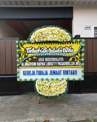 Papan Bunga Duka di Kayu Ombun