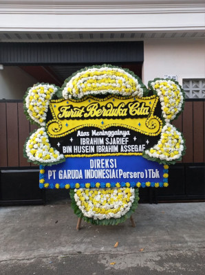 Papan Bunga Duka di Kayu Ombun